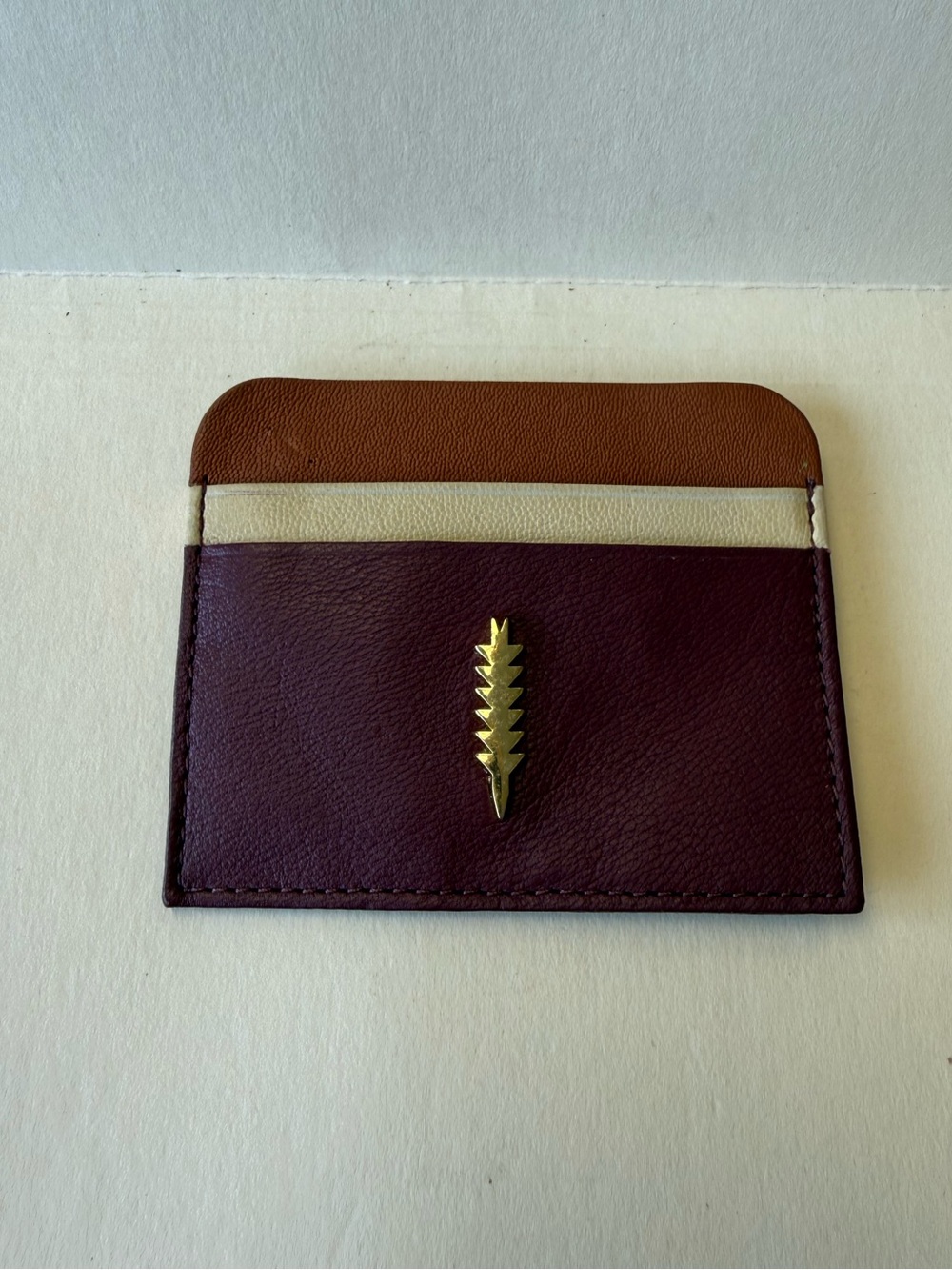 Thacker New York Genuine Leather Card Holder in Burgundy, Tan & Cream with Gold.